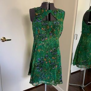 Green lightweight sleeveless dress with cut-out